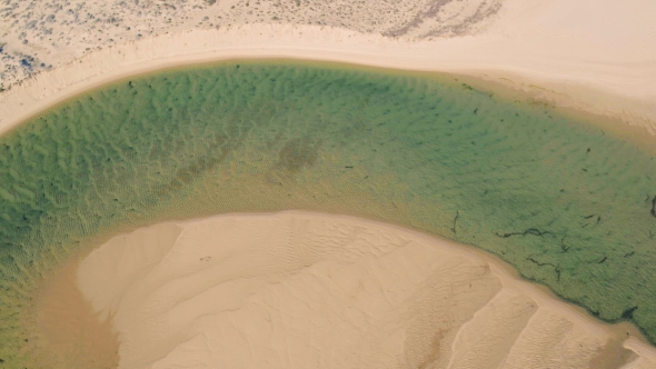 Aerial View Above Ocean Beach with Lagoon