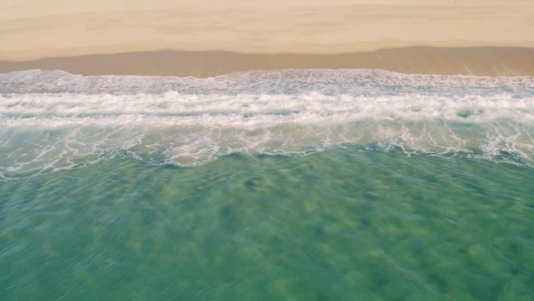 Aerial View Small Waves on Sandy Beach