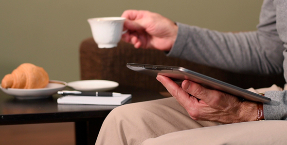 Man Working On A Tablet Computer