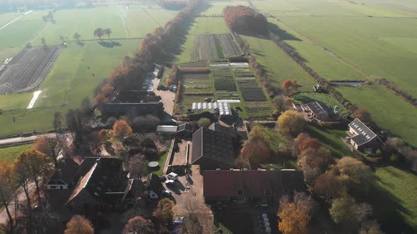 Overview of a biological dynamic farm in The Netherlands showing the diversity of its barns and crop