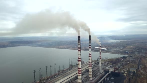 Aerial View of High Chimney Pipes with Grey Smoke From Coal Power Plant