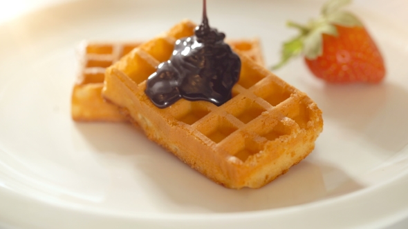 Waffles with Melted Chocolate with Strawberry