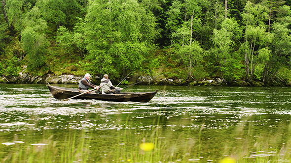 Old Men Fishing Out Of A Row Boat