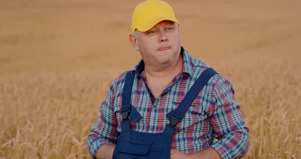 Portrait of a Male Farmer in a Wheat Field