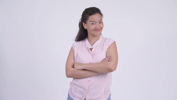 Happy Young Beautiful Asian Businesswoman with Arms Crossed