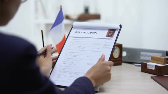 Immigration Inspector Denying Visa Application, French Flag Table, Citizenship