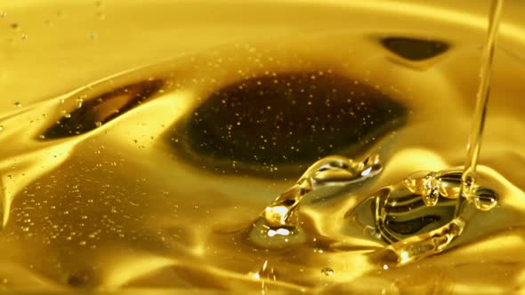 A Jet of Olive Oil Flows with Waves and Splashes