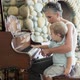 Grandmother and grandson playing piano - VideoHive Item for Sale