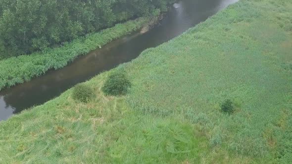 Sky view footage of the River Otter and its amazing nature and ecosystem around it. Very peaceful lo