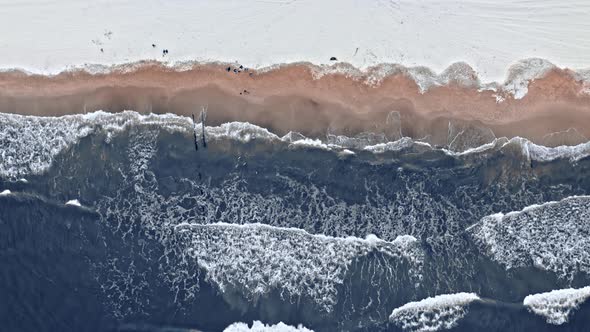 Extreme sport in winter. Cold winter swim in Baltic sea.