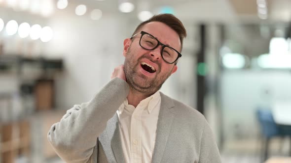 Stressed Creative Man Having Neck Pain