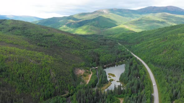 4K Drone Video (truck shot) of Mountains along Chena Hot Springs Road near Entrance of Resort outsid