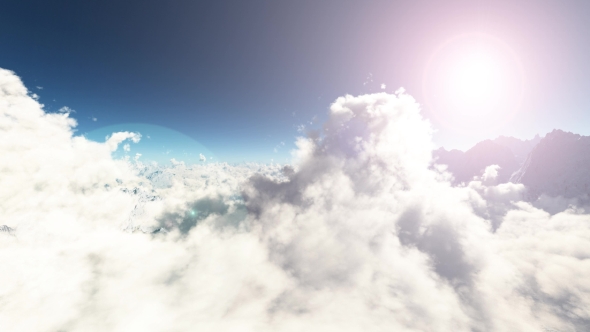 Loop Mountains in Snow and Clouds at Blue Sky alt