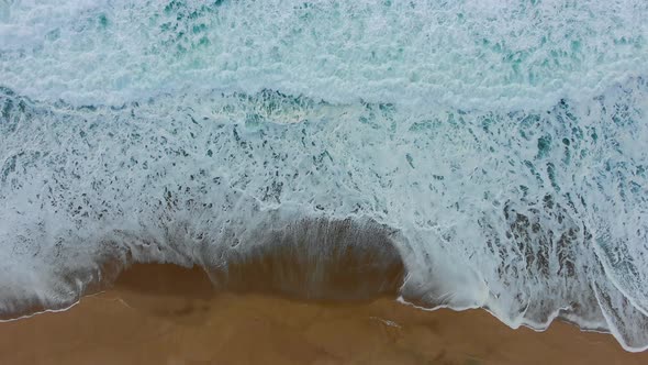 Seascape with Ocean Waves Rolling on Empty Beach Upper View