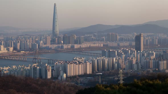 Timelapse Seoul Lotte World Tower Among City Buildings