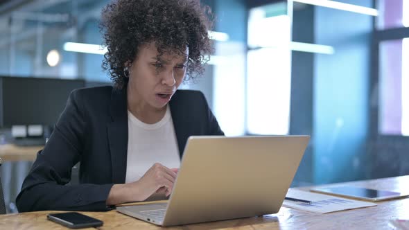 Shocked Businesswoman Reacting To Failure at Work