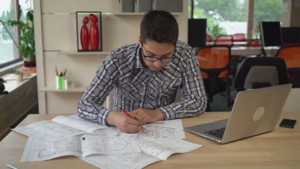 Mixed Race Man Holding Pencil and Line