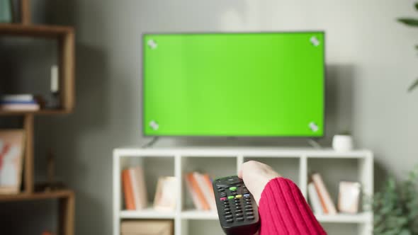 Woman Watching Television with Chroma Green Screen