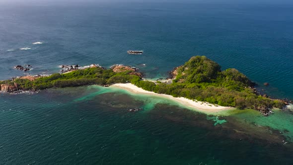 Aerial Drone of Seascape with a Tropical Pigeon Island