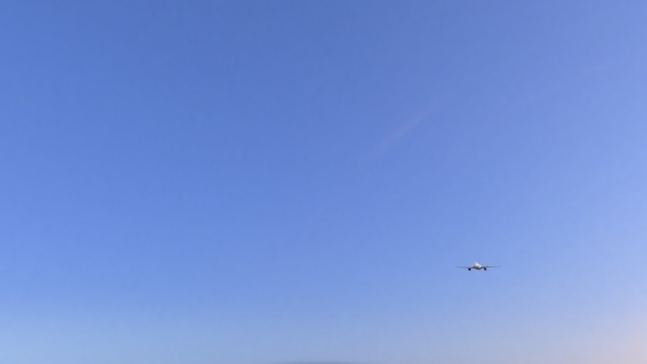 Commercial Airplane Arriving To Cancun Airport Travelling To Mexico