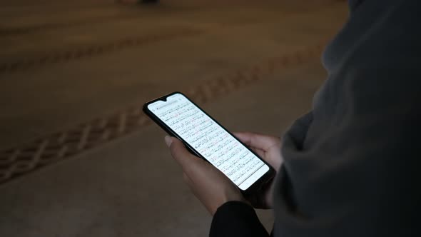 Reading Holly Book at Mosque