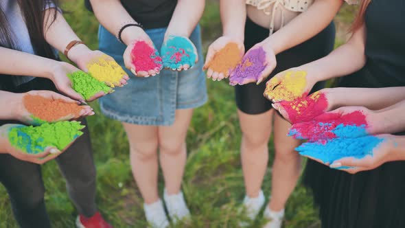 Holi Paints in the Hands of Girls