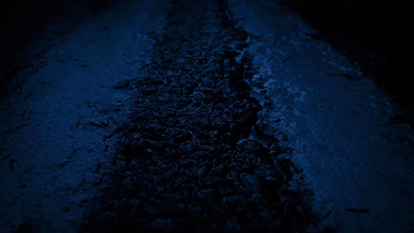 Moving Over Wet Road At Night