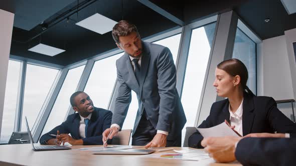 Business people brainstorming on a new project. Corporate manager communicating with a business team