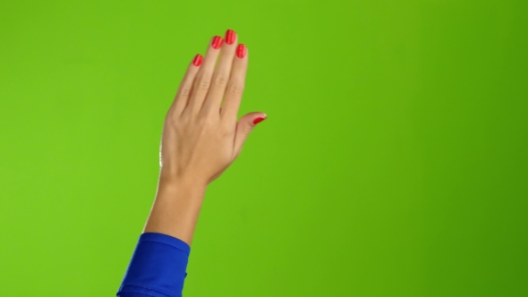 Left Hand Is Widely Waving Goodbye or Hello. Green Screen