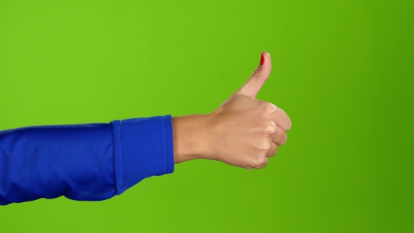 Hand Showing Thumbs Up Twice Per Frame. Greeen Screen Studio