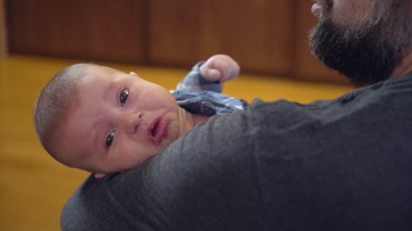 Crying Newborn with Dad.