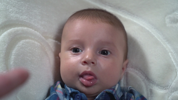 Portrait Newborn with Blue Eyes.