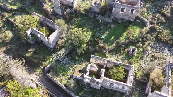 Historical Lycian village of Kayakoy, Fethiye, Mugla, Turkey. Drone aerial shot above of the Ghost T