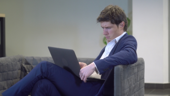 Young Male Working with Computer