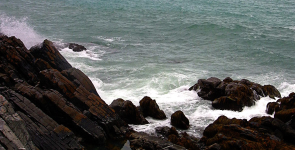 Waves Breaking On The Rocks