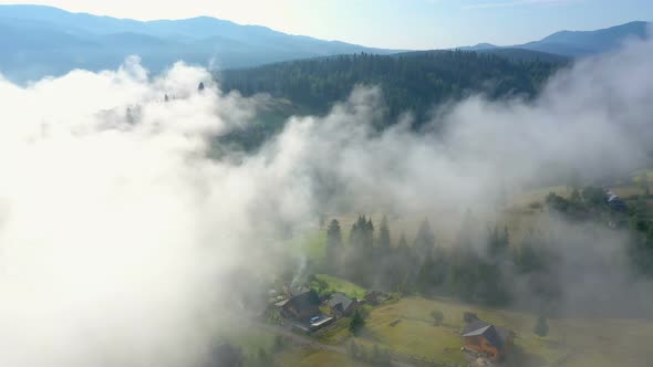 Morning Mountain Village Covered With The Clouds 12