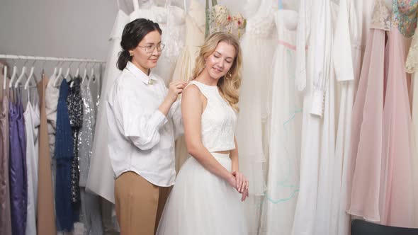 Beauty, Wedding Concept. Tailor and Bride