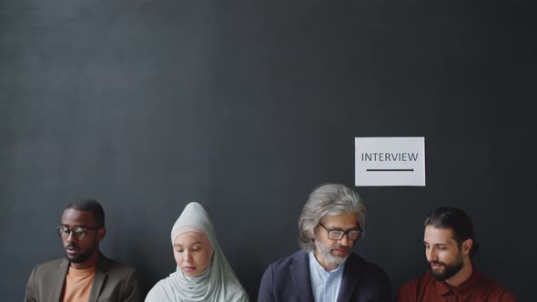 Diverse People Waiting Together for Job Interview