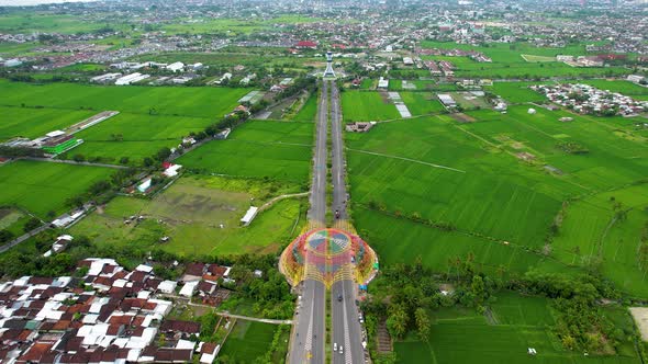 Aerial view of the city colorful Monument Tembolak Rainbow on Mataram