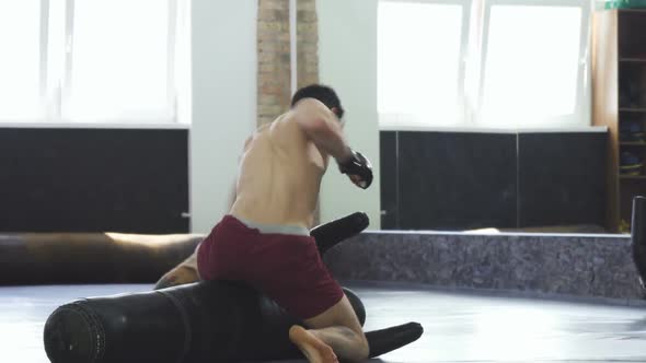 Professional Mma Fighter Practicing Grappling and Punching at the Gym 1080p