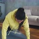Tired Woman in Yellow Hoodie Does Push Ups Standing on Knees - VideoHive Item for Sale