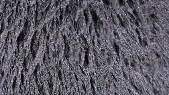 Magnetic Chips Form Patterns in a Magnetic Field alt