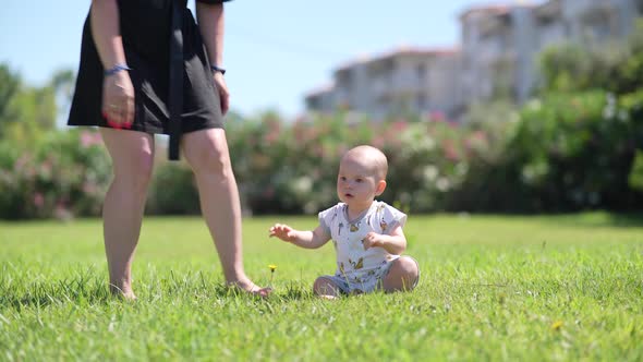 Baby's First Steps on the Grass