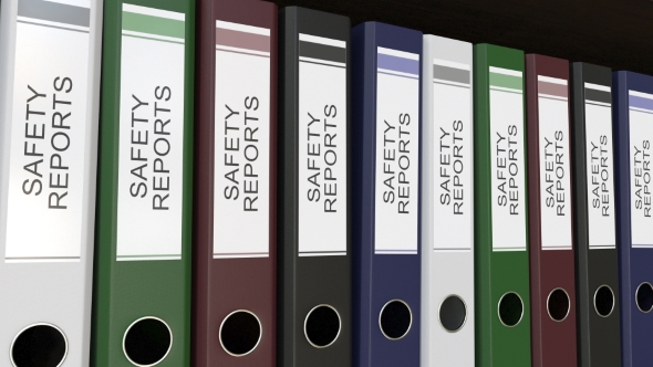 Line of Multicolor Office Binders with Safety Reports Tags