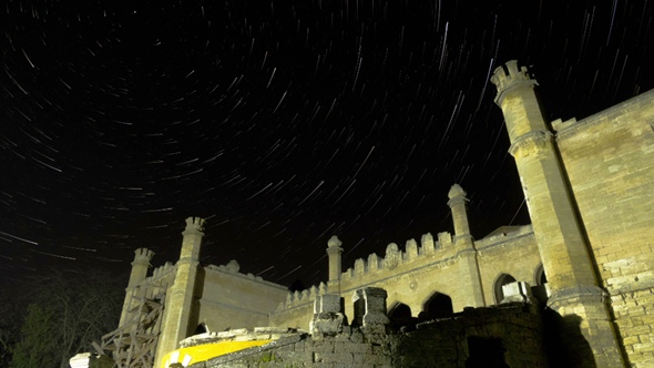 Star Trails Over Scenic Abandoned Ruin of Building