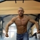 Bodybuilder Is Working On His Chest With Cable Crossover In Gym. Smoke on Background - VideoHive Item for Sale