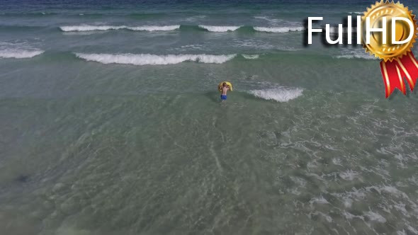 Flight Over the Little Boy Who Plays on the Beach