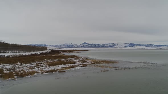 Ice forms along the shoreline of the south end of Utah Lake near Lincoln Beach, looking toward the w