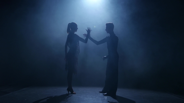 Black Background. Dance Element From the Rumba, Silhouette Couple Ballroom