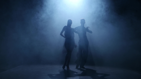 Dance Element From the Salsa, Silhouette Couple Ballroom. Smoke Background